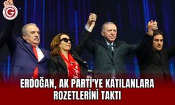 Erdoğan, AK Parti'ye katılanlara rozetlerini taktı